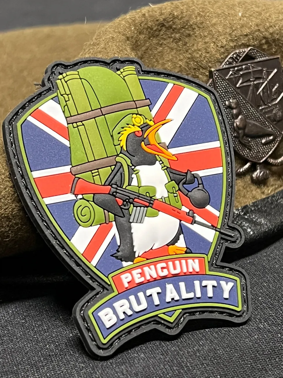 Forgotten Weapons Penguin Brutality moraalimerkki