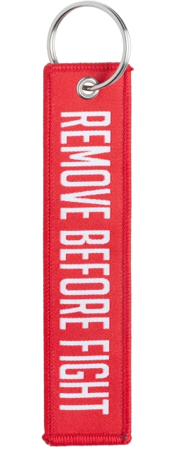 Varusteleka avaimenperä, REMOVE BEFORE FIGHT