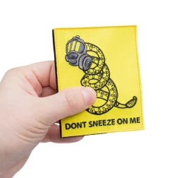 Varusteleka Don't Sneeze on Me moraalimerkki