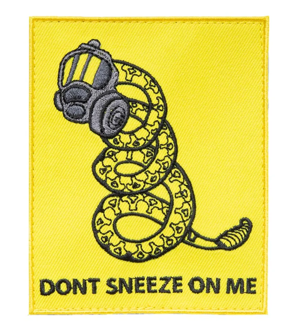 Varusteleka Don't Sneeze on Me moraalimerkki