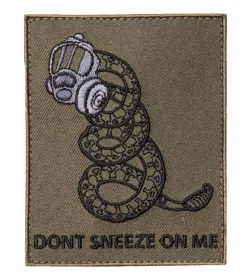 Varusteleka Don't Sneeze on Me moraalimerkki